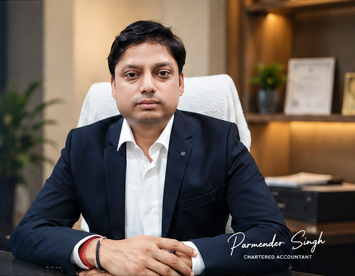 CA Parminder Singh seated in his office